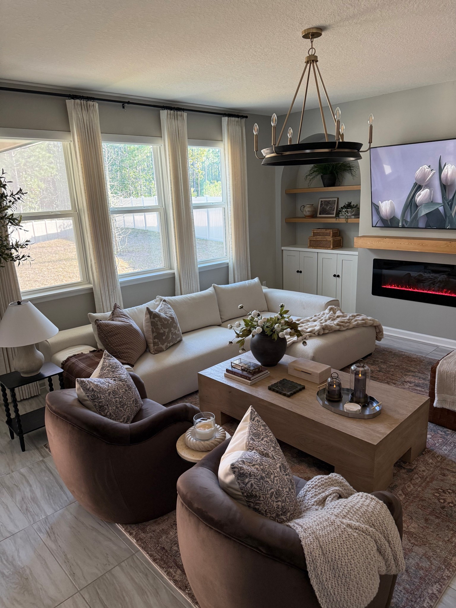 Current living room set up- so happy these beautiful accent chairs are back in stock! 

Living room inspo, living room chandelier, living room couch, living room accent chairs, living room coffee table, neutral home decor, Loloi rugs, Amazon curtains 

#LTKHome #LTKSeasonal