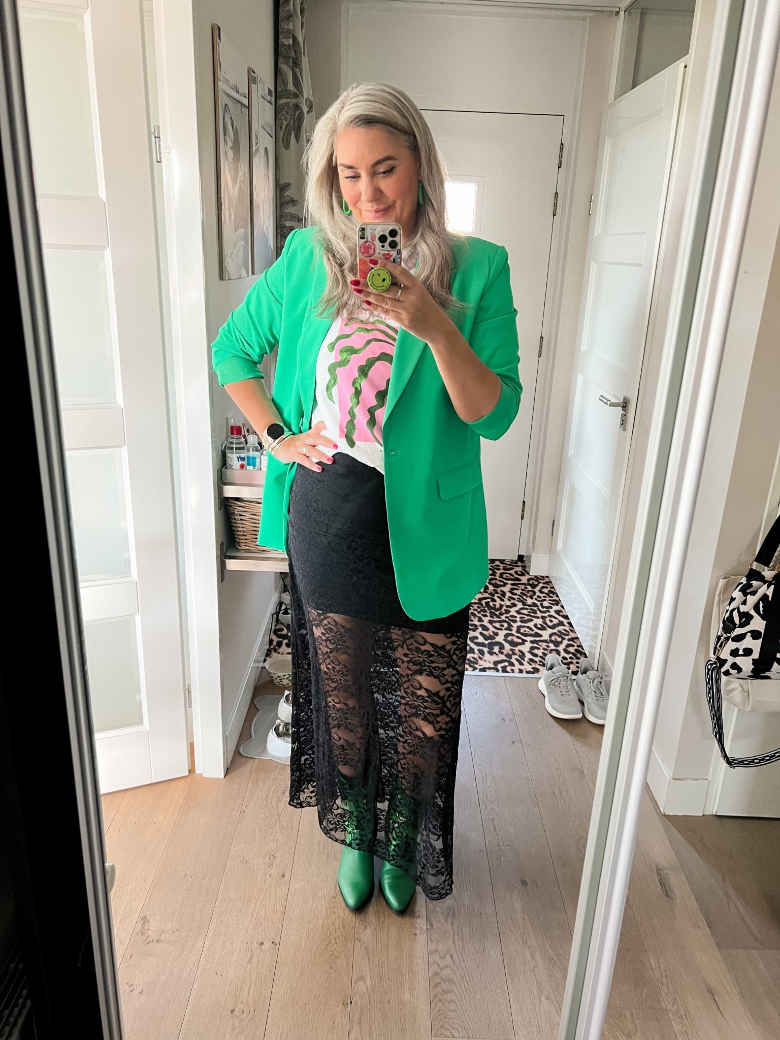 Ootd - Tuesday. Black tall lace maxi skirt with integrated under skirt paired with a graphic t-shirt (old, H&M), an oversized green blazer (old, Sisters Point) and green cowboy boots (old, Sacha). 



#LTKnederlands #LTKspring #LTKeurope