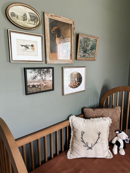 Vintage collage wall over baby boys crib adding such a unique look to display farm animals! 

#LTKhome #LTKbaby #LTKfindsunder50