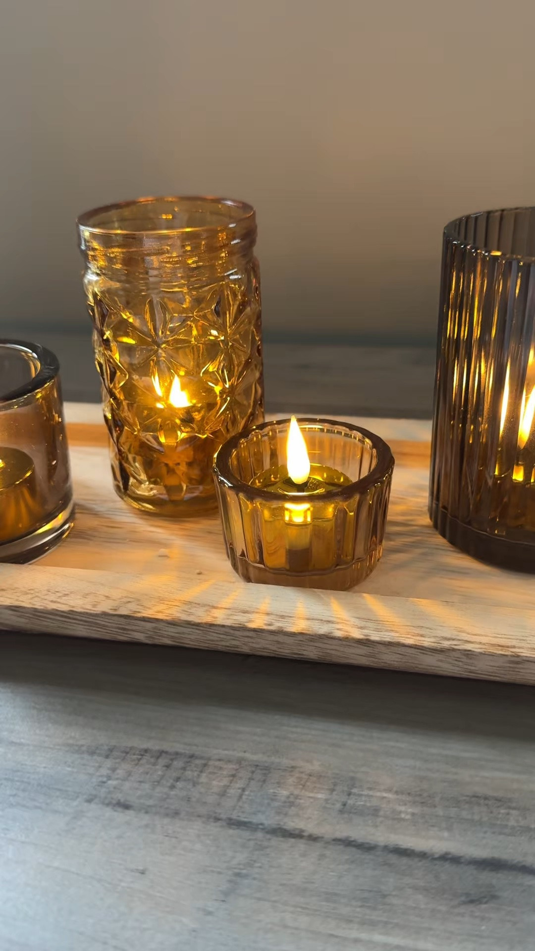 Wooden tray with 9 brown votive holders from Amazon is the perfect addition for mantel, buffets and shelf styling. Gold LED tealights with remote add to the atmosphere. Available in multiple colors. 

Neutral home decor, candle votives, decor for shelves and mantels, candle holders

#LTKHome