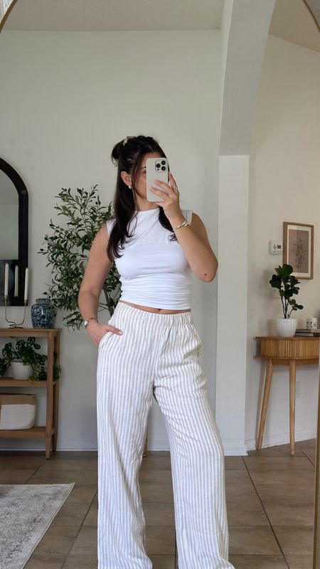 Linen pants spring outfit 
wearing xs tank and xs regular pants 

Abercrombie sale, spring outfit, vacation outfit, stripe linen pants 

#LTKSpringSale #LTKtravel #LTKsalealert