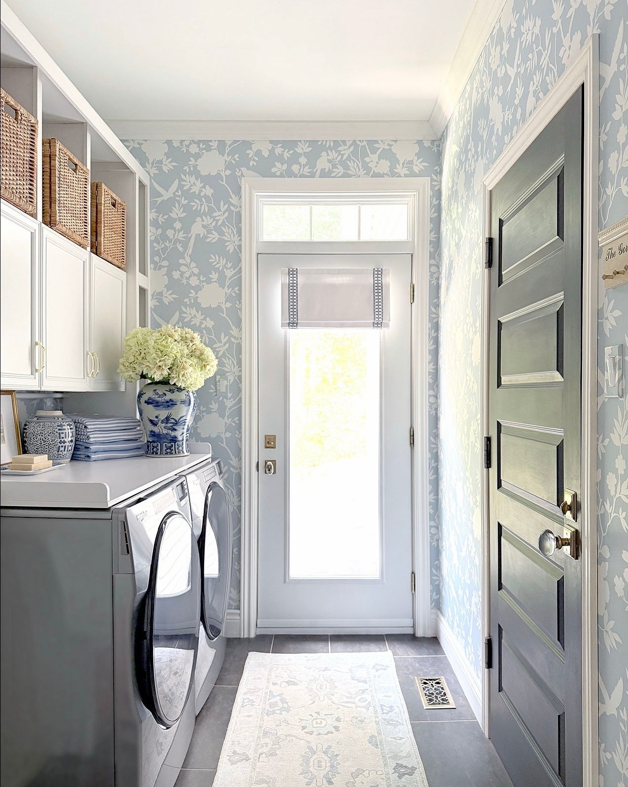 Our laundry room is one of my favorite makeovers! We installed this gorgeous chinoiserie wallpaper, a new rug and this affordable countertop that brings beauty and function to this space. Simple, affordable updates that make all the difference!

Home decor, coastal home, chic home, blue and white decor, home finds, spring finds, spring decor, spring home finds 

#LTKSeasonal #LTKHome
