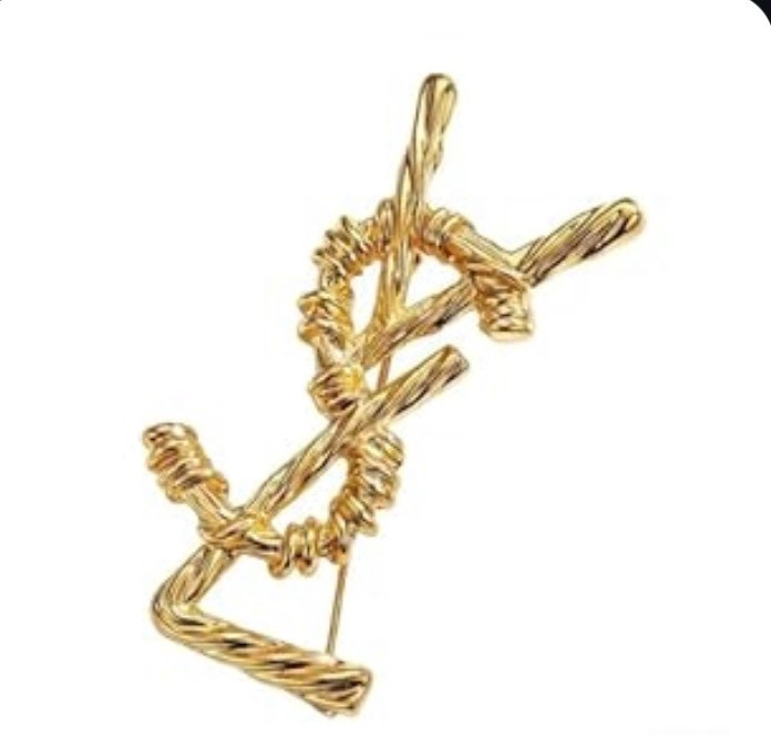 This pin is everything and it’s available again . Get it now before it’s not available anymore #ysl #cc #chanel #inspiredaccessory #necklace #earrings 

#LTKootd #LTKSaleAlert #LTKOver40