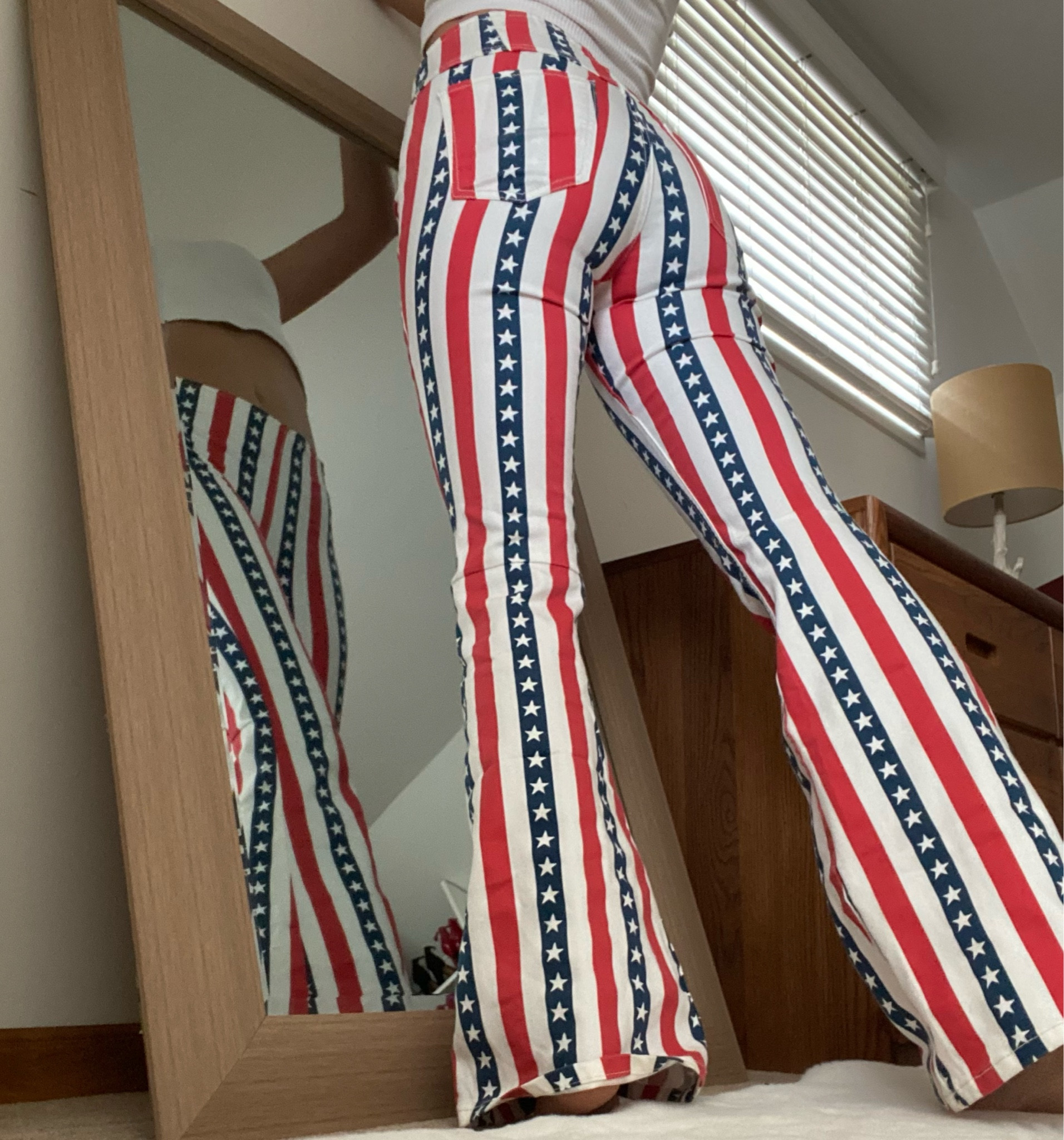 The perfect printed flare pants. 

#LTKstyletip #LTKSeasonal #LTKfindsunder100