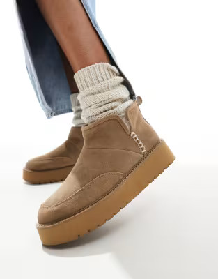 Stradivarius platform fluffy boots in beige | ASOS (Global)