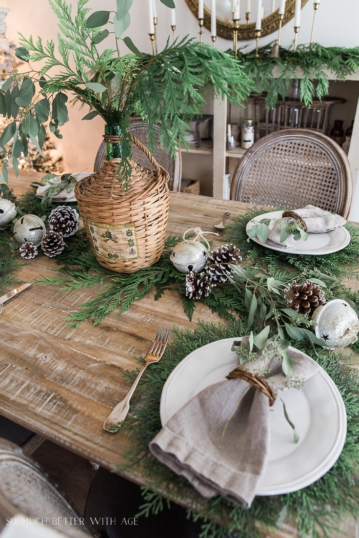 One of my favorite Christmas tablescapes with evergreen, pinecones, and vintage finds!  #naturaltable #evergreenpincones #vintagefinds #naturaltablescape #tablesettting

#LTKHoliday #LTKHome #LTKSeasonal