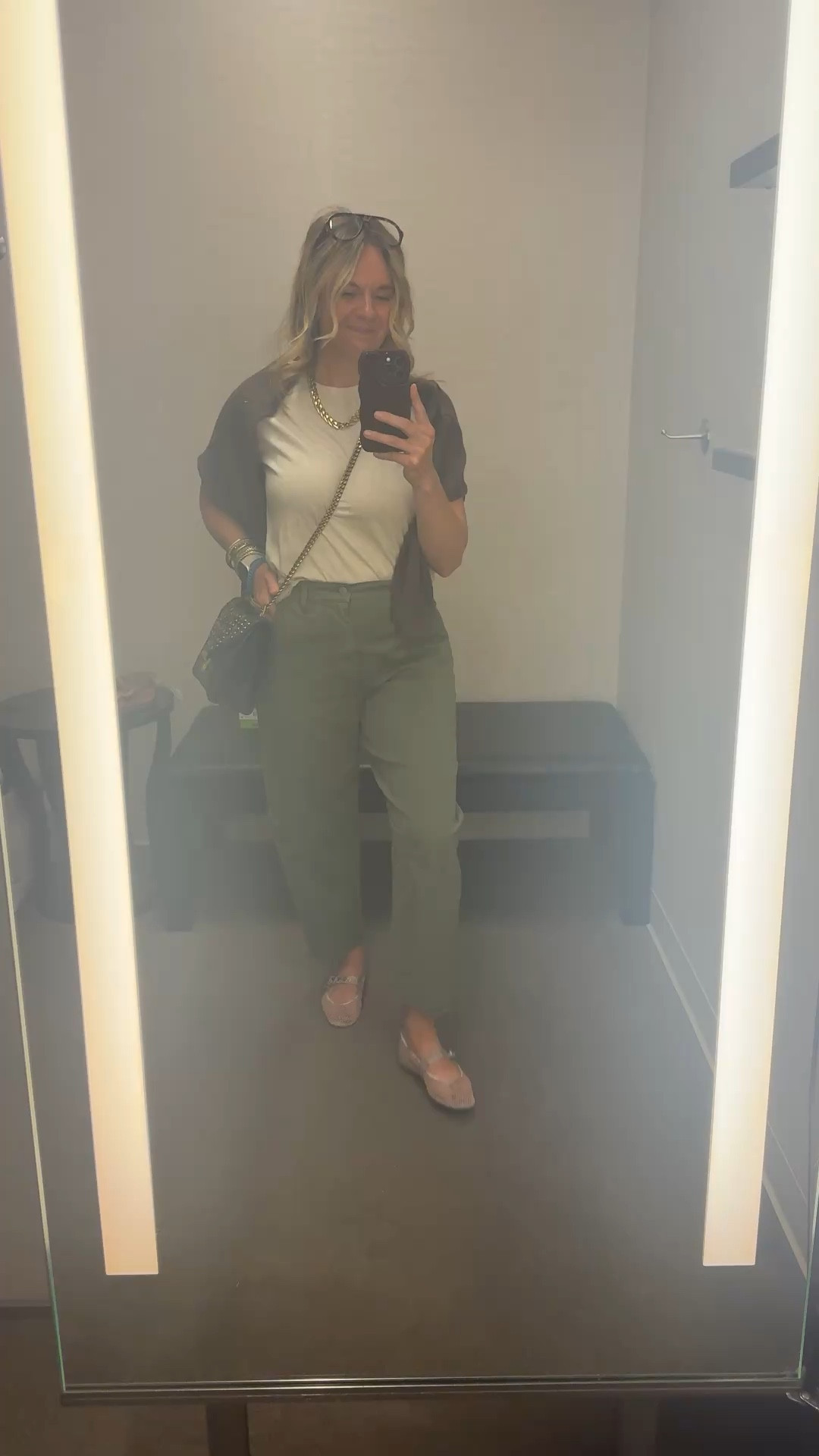 OOTD while setting up a dressing room for a client appointment ✨ Boxy neutral tee + olive barrel pants + brown waffle knit draped over the shoulders + mesh flats + gold accessories. All from my own closet — linked the exact pieces where I can and the closest versions where I can’t. Everything shoppable below! 👇

#LTKOver40 #LTKootd #LTKdayinmylife