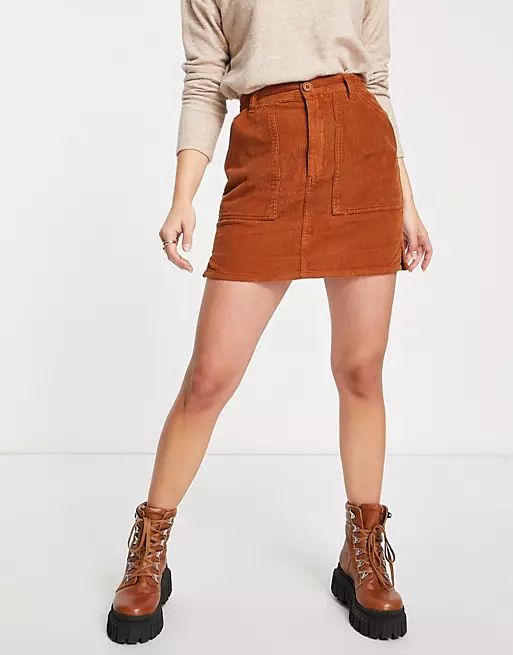ASOS DESIGN cord patch pocket mini skirt in rust | ASOS (Global)