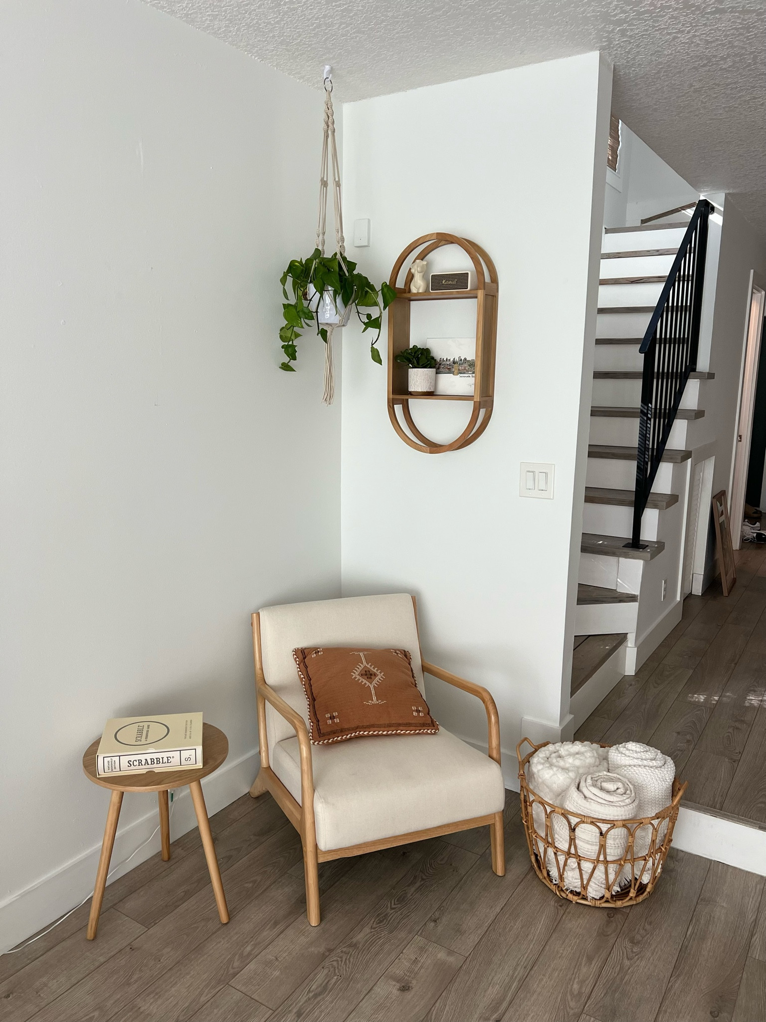 home details:
Chair: Amazon 
Blanket Basket: ikea
Side table: Amazon 
Pillow: Target 
Wall art: Target 
Hanging plant: Home Depot 
Scrabble: Amazon 