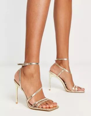 Schuh Santi strappy heeled sandals in gold | ASOS (Global)