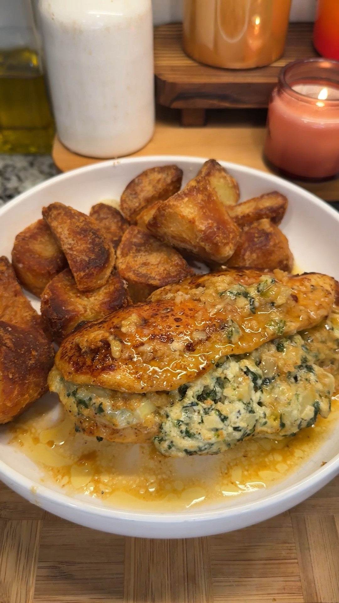 creamy spinach & artichoke stuffed chicken with crispy roast potatoes- date night at home has never looked so good❤️‍🔥
#kitchenfavorites #cookingessentials #kitchenmusthaves #datenight

Ingredients:
- 2 large chicken breasts, butterflied (generously season on both sides with salt, black pepper, onion powder, garlic powder, paprika)
- 14 oz artichoke hearts, chopped finely
- 1/3 cup thawed spinach, chopped
- 4 oz softened cream cheese
- 1/2 cup shredded mozzarella cheese
- 1/2 tsp salt
- 1/2 tsp black pepper
- 1 tsp onion powder
- 1 tsp garlic powder
*sear on both sides then bake in oven at 350°F until cooked through, about 12-15 minutes depending on size
- 4 tbsp butter
- 4 cloves garlic, minced

roast potatoes:
- 4 russet potatoes, peeled and cut in large chunks
- 3 tbsp bacon grease (can use avocado oil)
*bake at 425°F for 45 minutes to an hour, flipping every 20 minutes
- sprinkle of salt


#LTKHome #LTKSeasonal #LTKFamily