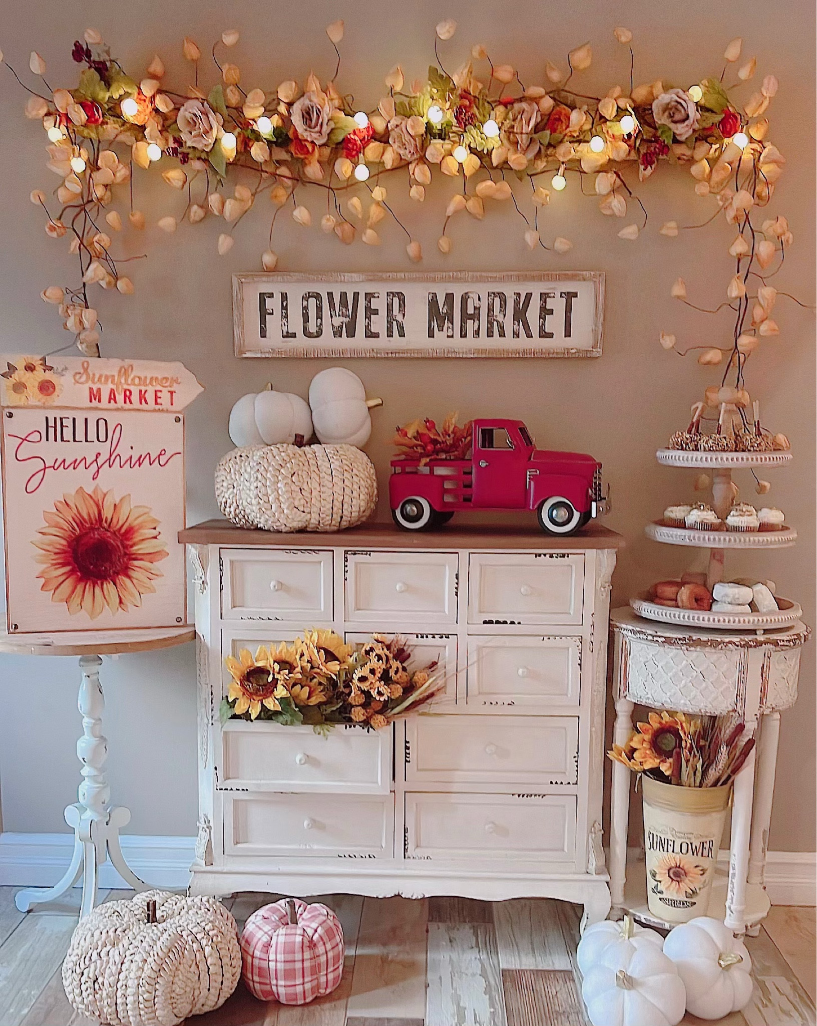 Meet me at the Sunflower Market 🌻

Create the most enchanting sunflower entryway for fall with a whimsical hanging floral garland, sunny sunflower accents, the cutest red pick-up truck, a distressed farmhouse dresser, the coziest fabric pumpkins, and a rustic tiered tray filled with festive fall treats! 


#LTKhome #LTKSeasonal #LTKwedding