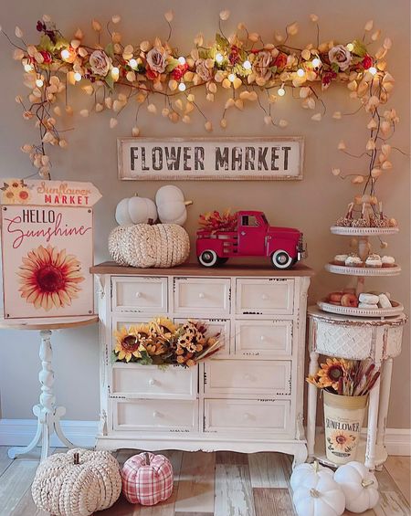 Meet me at the Sunflower Market 🌻

Create the most enchanting sunflower entryway for fall with a whimsical hanging floral garland, sunny sunflower accents, the cutest red pick-up truck, a distressed farmhouse dresser, the coziest fabric pumpkins, and a rustic tiered tray filled with festive fall treats! 


#LTKhome #LTKSeasonal #LTKwedding