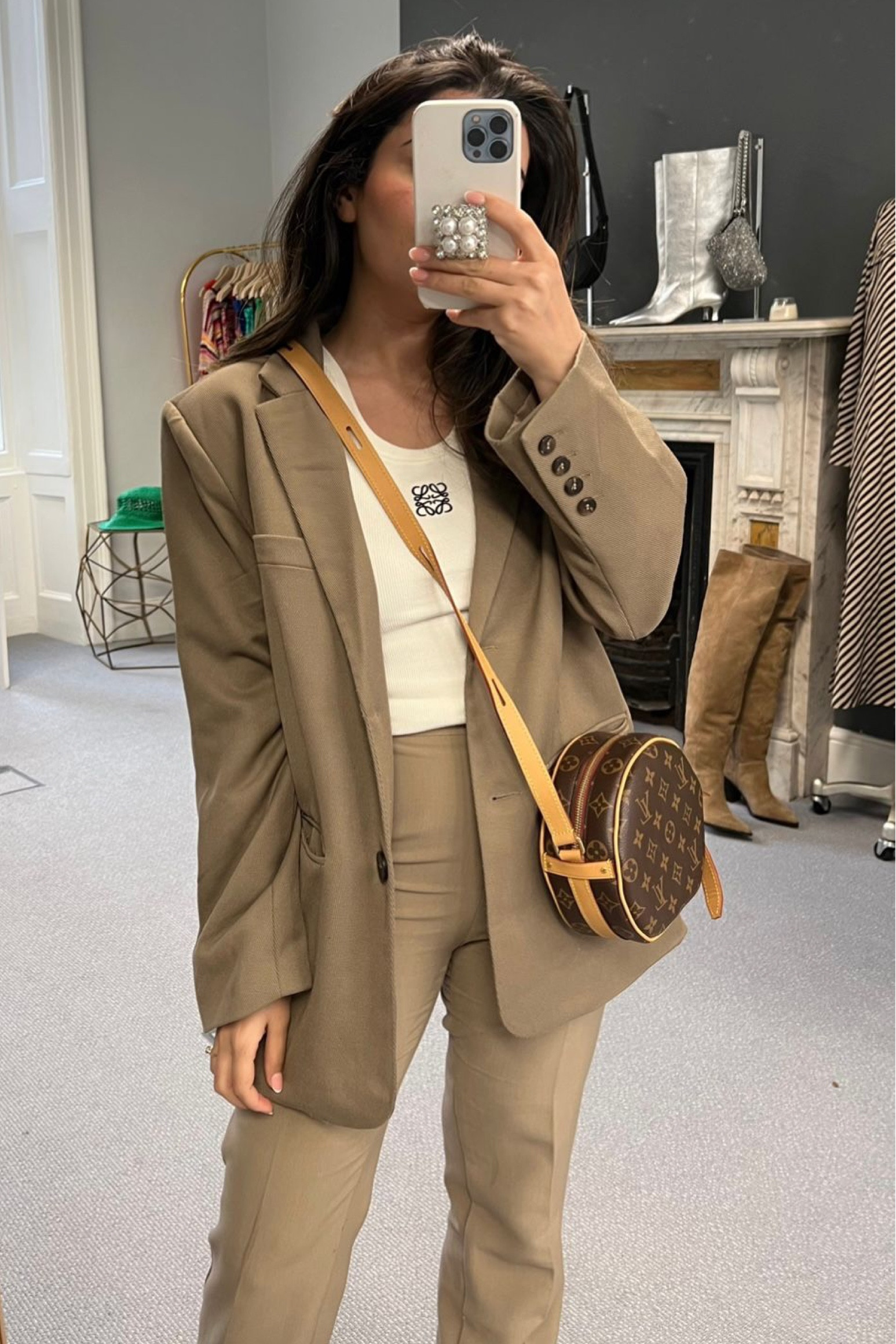 Neutral, tonal outfit, neutral suit, Loewe tank top, minimal outfit, brown, Louis Vuitton, ribbed tank top, white tank top, split seam trousers, single breast blazer, minimal suit, crossbody bag, Louis Vuitton bag, minimalistic, spring outfit ideas, summer looks, office outfit idea 

#LTKfit #LTKeurope #LTKSeasonal