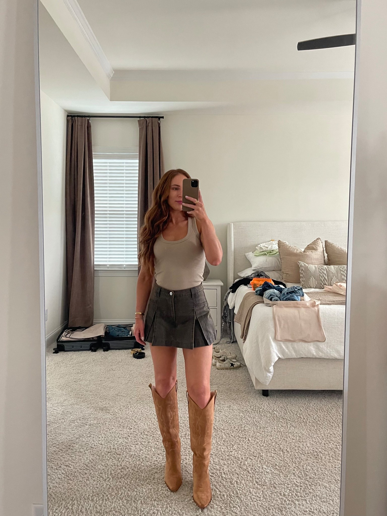 Abercrombie tank, 
Amazon cowboy boots, insanely good for the price !!! 
old Zara skirt, linked similar 

#LTKSaleAlert #LTKFindsUnder100 #LTKSeasonal