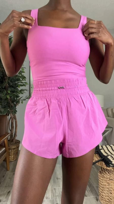 Pink flyaway workout onesie with pockets!

#LTKVideo #LTKFitness #LTKFindsUnder100