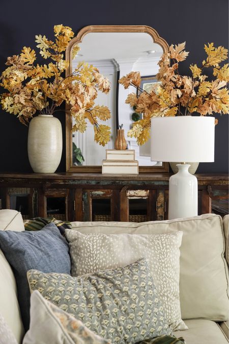 Golden leafy fall stems pop against the Hale Navy painted walls in my living room. 

And the neutral autumn throw pillows add to the cozy vibe!

#LTKhome #LTKSeasonal