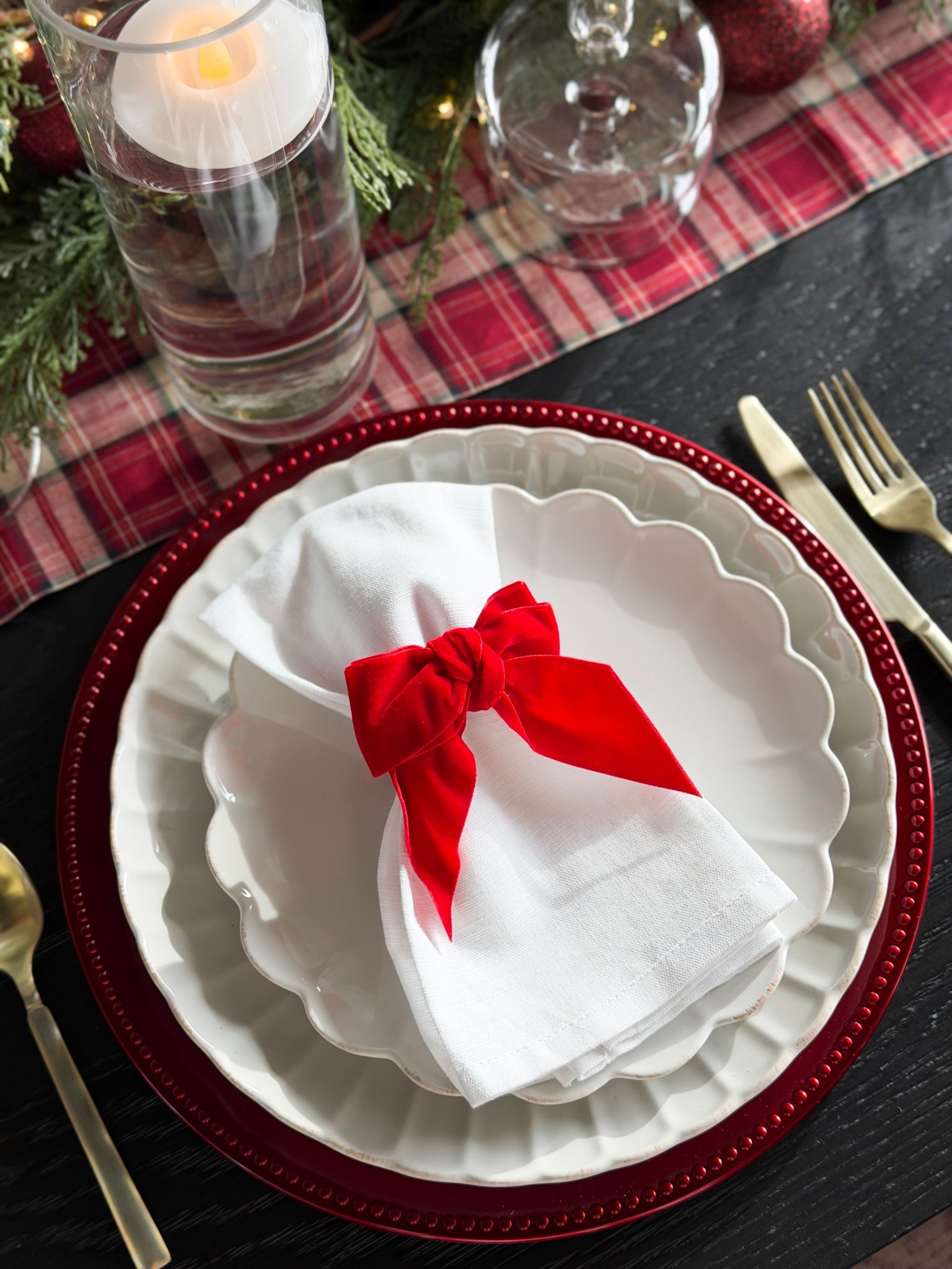 Holiday table setting that I cannot get enough of!

Holiday, holiday decor, holiday home, holiday home decor, holiday hosting, Christmas, Christmas decor, Christmas dinner, red bow, plaid, table runner, dinnerware, silverware, red charger, scalloped plates, candles

#LTKHoliday #LTKHome #LTKSeasonal
