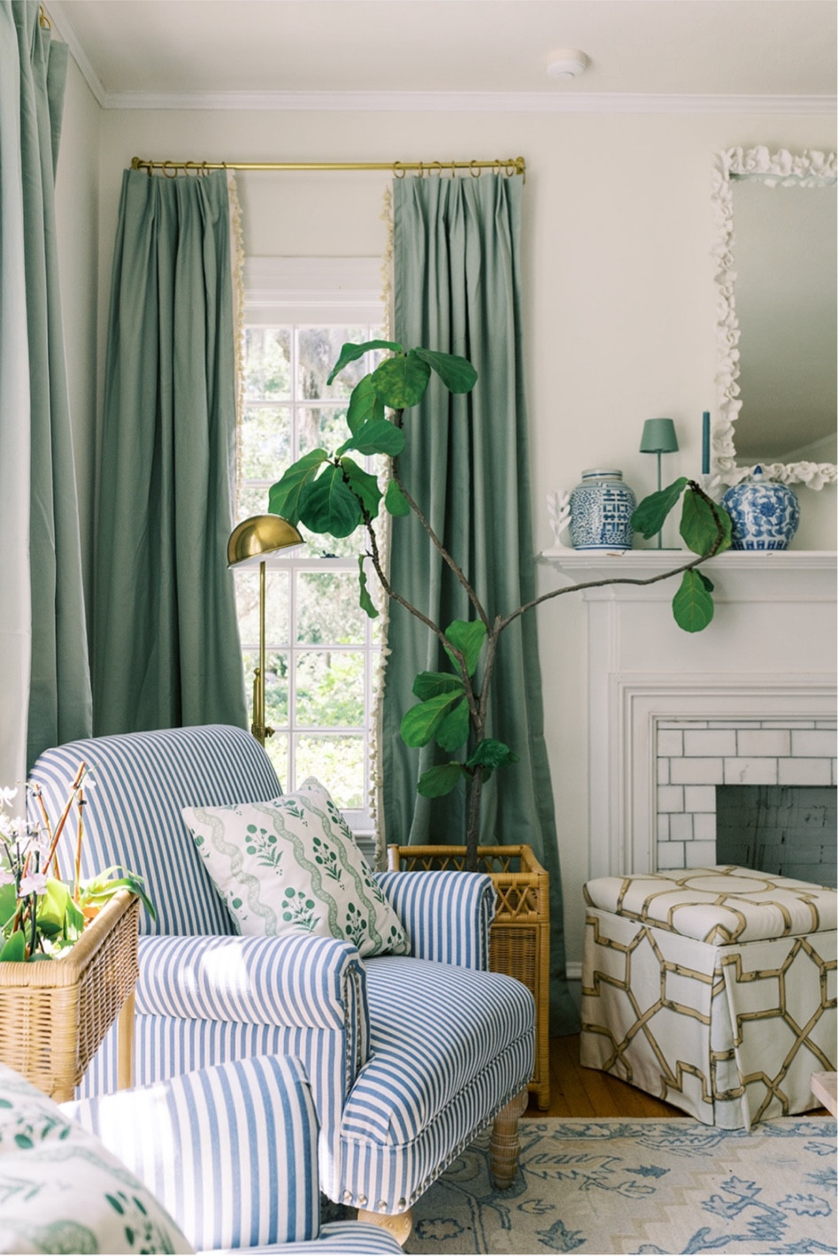 New custom sage curtains with tassels for our traditional / coastal living room.  Love the wicker accents - think every room needs a touch! 

#LTKfamily #LTKstyletip #LTKhome