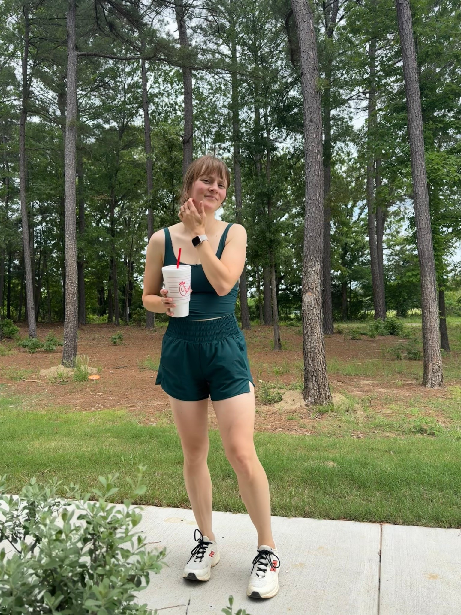 Post run Diet Coke 🥤 hits the spot lol  
Love this workout set though. Held up so well during my run and I was able to just pull down the top to nurse my baby afterwards . Wearing size XS bottoms and S top