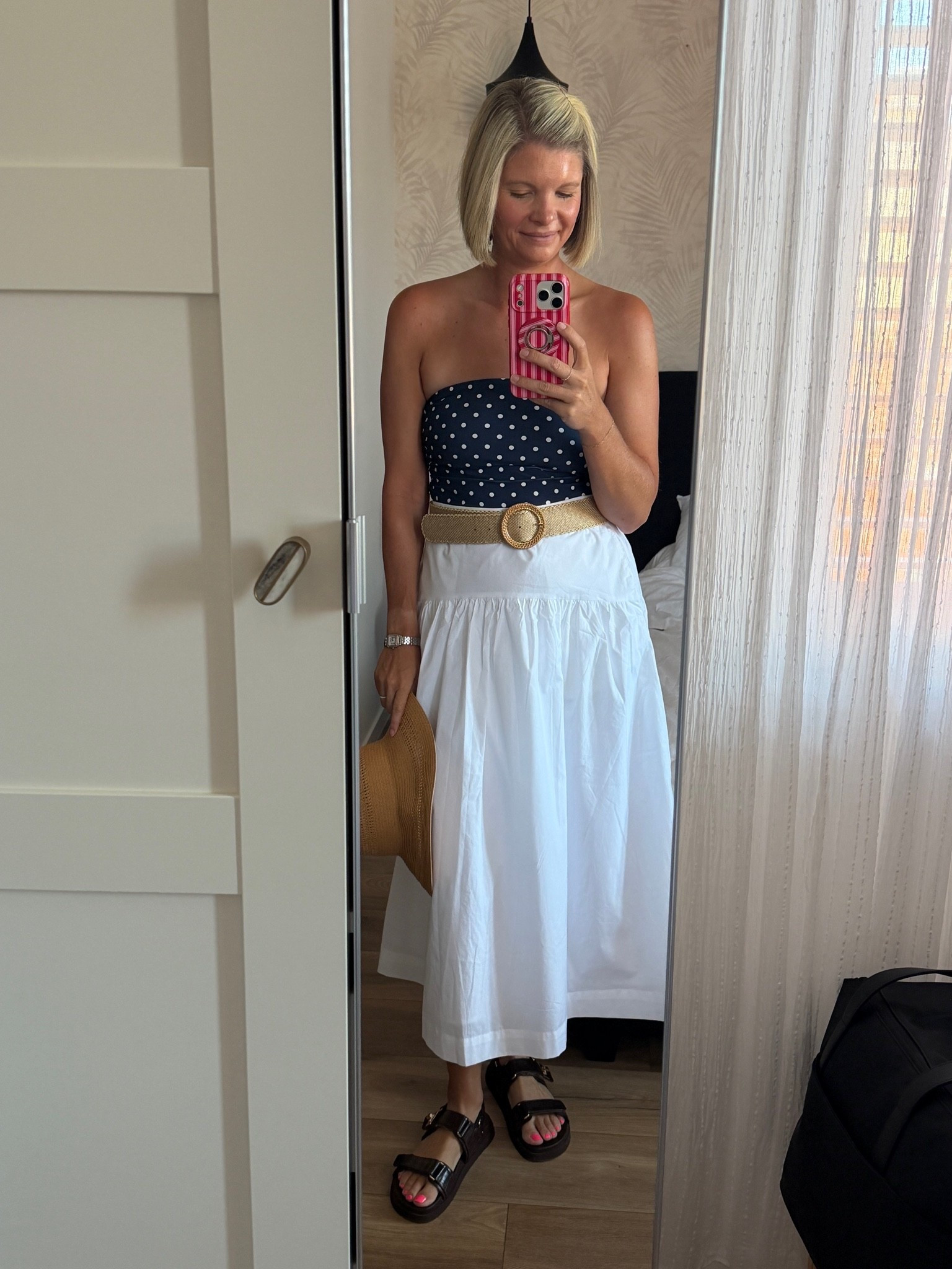 Blue and white polka dot strapless top with built in padding TTs
White midi cotton poplin skirt with pockets TTs (go down if in between)

#LTKOver40 #LTKTravel