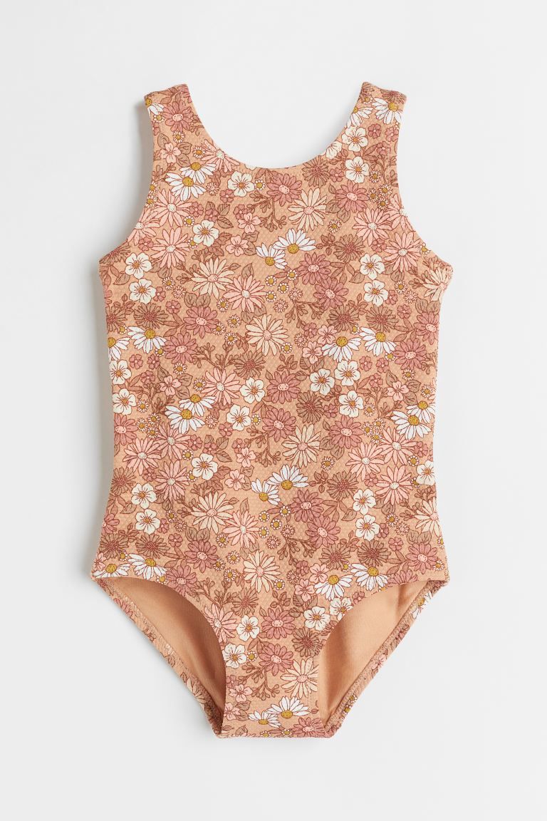 Kids Exclusive. Fully lined swimsuit in textured fabric with a printed pattern in earth tones. | H&M (US + CA)