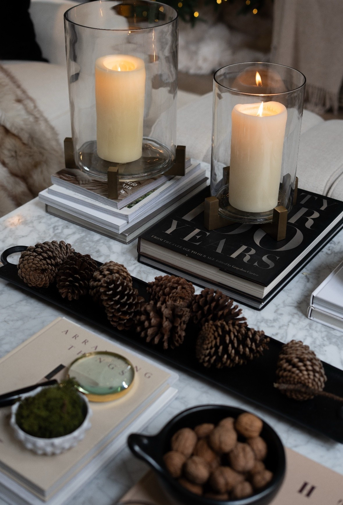 OMG I’m obsessed with this cozy holiday setup! I styled my coffee table with flickering candles, pinecones, and modern neutral décor to create the ultimate winter ambiance. Every detail feels warm, elegant, and timeless — the perfect cozy-chic living room vibe for Christmas entertaining and seasonal home inspiration! 

#LTKHoliday #LTKHome #LTKSeasonal