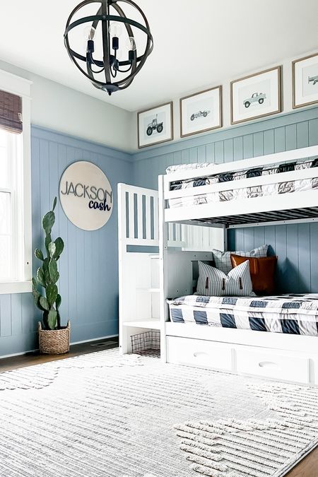 Big boy bedroom! Bunk bed with drawer storage high low area rug boutique rugs custom vehicle prints, wall art from Etsy Gallery, photo and picture frames target vines, nursery name, sign, faux, artificial, cactus, round, or chandelier, light fixture trucks race cars monster truck airplane motorcycle 

#LTKhome #LTKFind #LTKkids