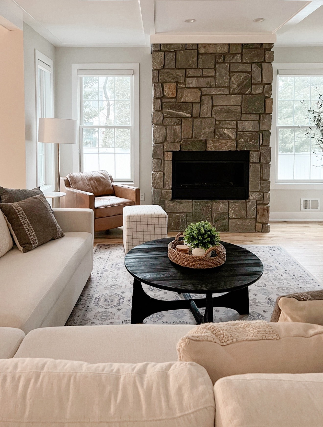 One of my favorite round coffee tables! Love the bold black wood finish and the legs are such a cool shape. Great price-point! 

#LTKHome #LTKmorningroutine #LTKSeasonal