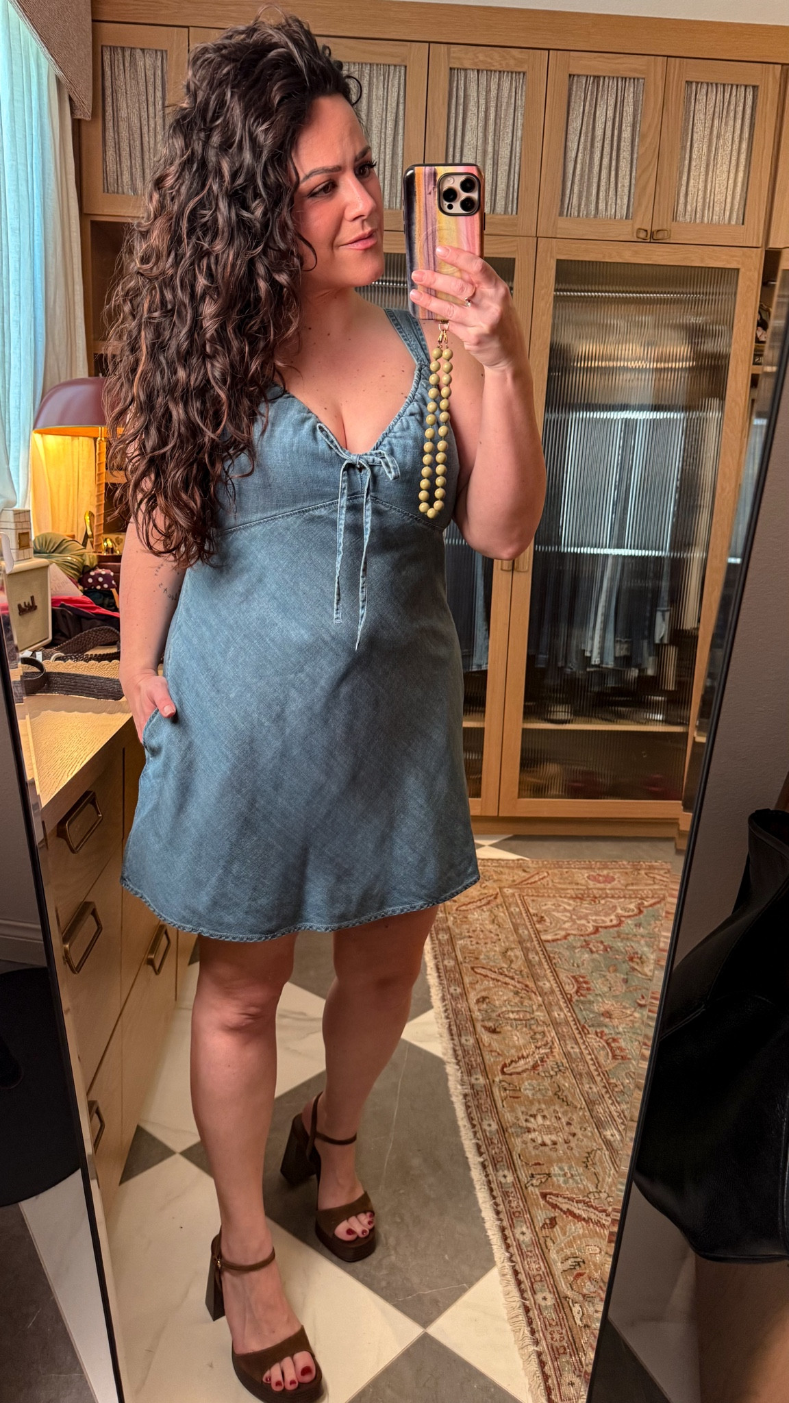 Trying on some midsize vacation dresses, denim chambray dress & it has pockets!!!! wearing a size large i am a size 14, 38dd & 5’6. 

also i get so many questions about my phone case and beaded strap, linked it for you too. 🫶🏻

#LTKMidsize #LTKSeasonal #LTKOver40