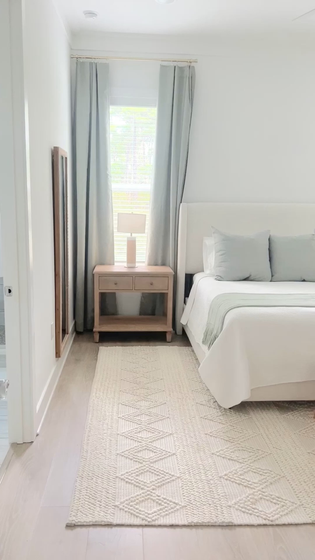 Modern coastal primary bedroom. Sage green bedding. 

#LTKStyleTip #LTKVideo #LTKHome