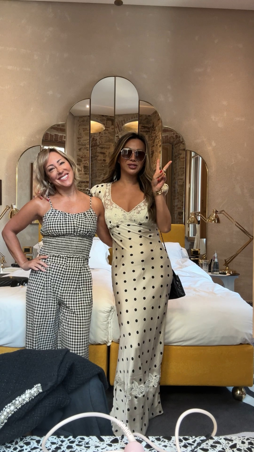 Polka dot dress, gingham top and pants, Italy trip, travel style. We both wear a small  

#LTKStyleTip