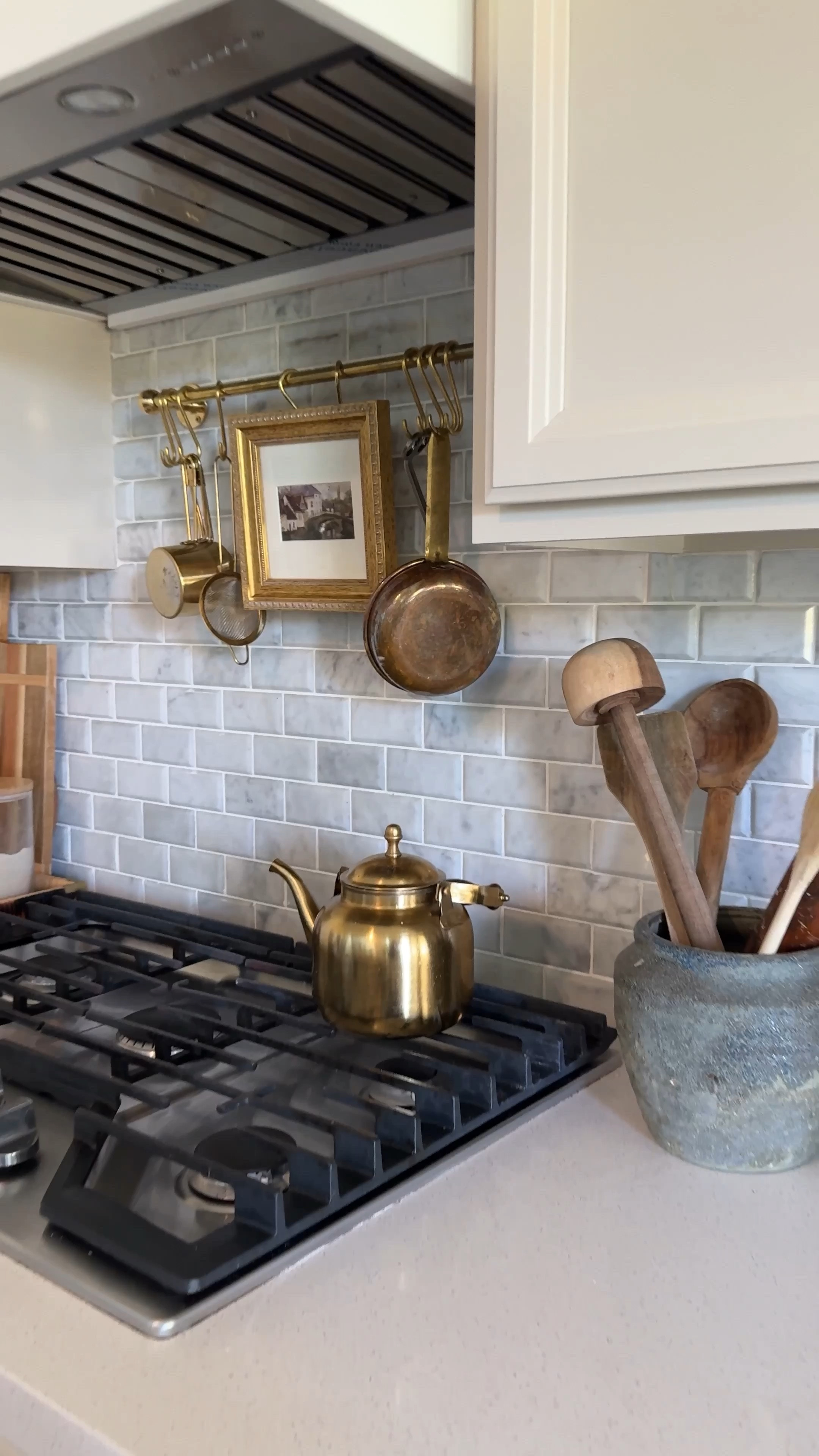 DIY kitchen brass rail for hanging pots and pans. Unlacquetrd brass 

#LTKStyleTip #LTKHome #LTKVideo
