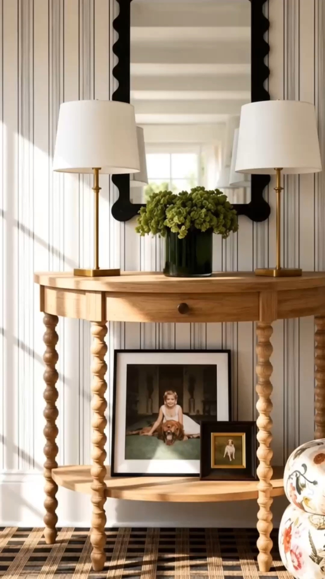 Imagine coming home to an entry like this. ✨ A thoughtfully designed entryway sets the tone the moment you walk through the door — warm, welcoming, and polished, with just the right balance of classic character and modern simplicity.

The Conway Console is the feature of this space. I especially love its distinctive bobbin-turned legs — a timeless detail that gives the piece so much character and sophistication, while the clean silhouette keeps it feeling fresh and current. The lower shelf adds another beautiful layer for styling favorite objects or framed memories.

And that center drawer is such a thoughtful detail for an entryway. It keeps everyday essentials like keys, sunglasses, mail, or your phone close at hand without leaving clutter on the console top.

Paired with the striped wall treatment, sculptural mirror, classic table lamps, greenery, framed photographs, and a patterned rug, the whole entry feels collected, inviting, and effortlessly modern classic.

Serena & Lily Labor Day Sale — up to 40% off everything, ends today. Don’t miss the final opportunity to refresh your entryway for the holiday and gathering season ahead.

#LTKHome #LTKSale #SerenaAndLily #CoastalStyle #Entryway #FoyerDesign #ConsoleTable #TableLamp #StripedWallpaper #TurnedLegConsole #ModernClassic #LuluAndGeorgia #AreaRug #HomeDecor #InteriorDesign #SaleAlert #LTKdayinmylife #LTKHome #LTKSaleAlert #LaborDaySale

#LTKdayinmylife #LTKHome #LTKSaleAlert