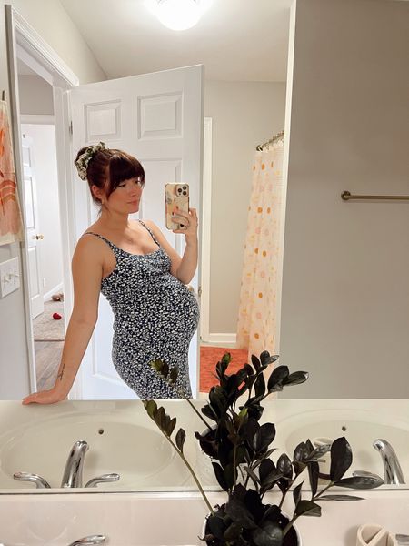 Another pregnancy favorite! Comes in multiple colors, built in bra, comfy, and stretchy 🙌 Been living in this during this heat 

#LTKunder50 #LTKbump #LTKsalealert