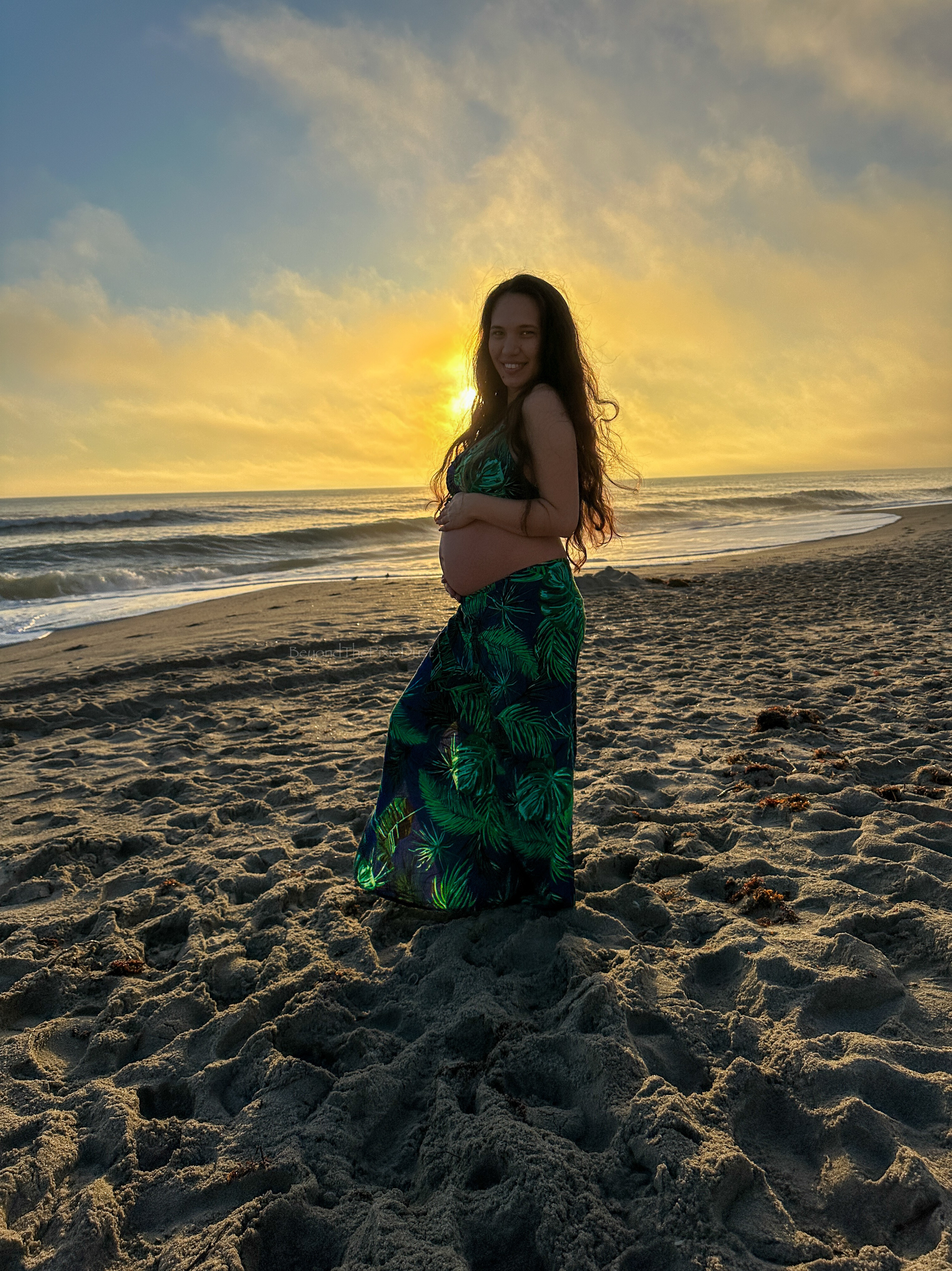 On my baby moon, I headed to the beach with my primary goal: to relax and attempt to take sunrise photos. So my boyfriend and I woke up to see no sun out for sunrise, but after we waited a bit, the sun peaked out, and we rushed down to the beach to take some photos! I wore a Hawaiian shop-made two-piece set with wrap pants and a marching top perfect to showcase the bump and wear at any size. When not pregnant, I wear the pants high rise, but with the bump, I made it low rise. I linked a few prints from a Hawaiian local Etsy shop and similar items to recreate this look on your own! It is also a perfect vacation resort outfit! It was perfect for me to share the news of my SONshine and take some bump photos!

#LTKBump #LTKBaby #LTKTravel