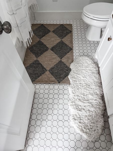 Loving this rug combo and do does my son

Bath rug / checkered rug / faux fur rug / neutral rug / neutral home /

#LTKhome #LTKfindsunder50