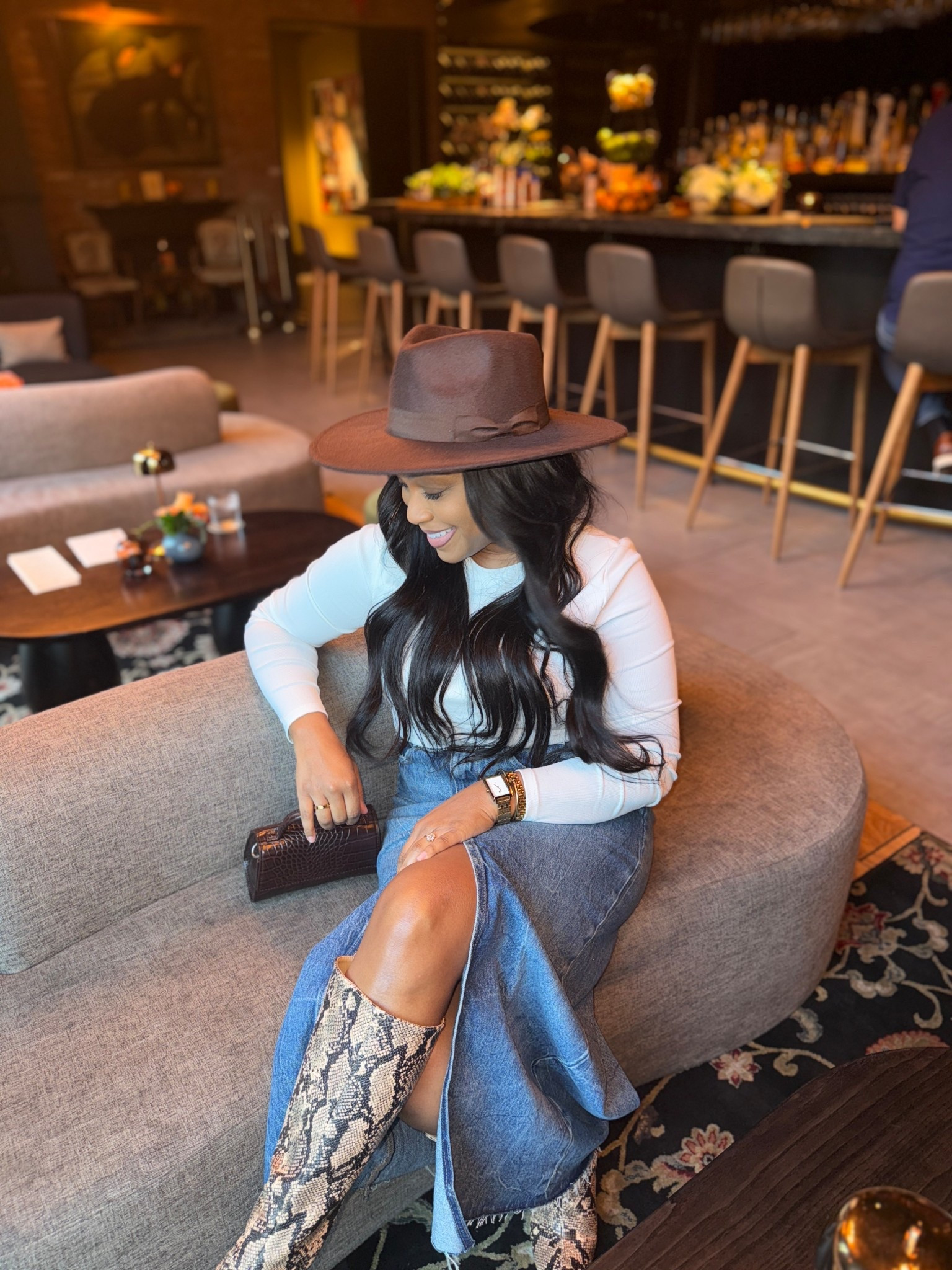 Fedora hats are still hot! Rocking my hat with a white long sleeve top and denim maxi skirt🤎

#LTKootd #LTKdayinmylife