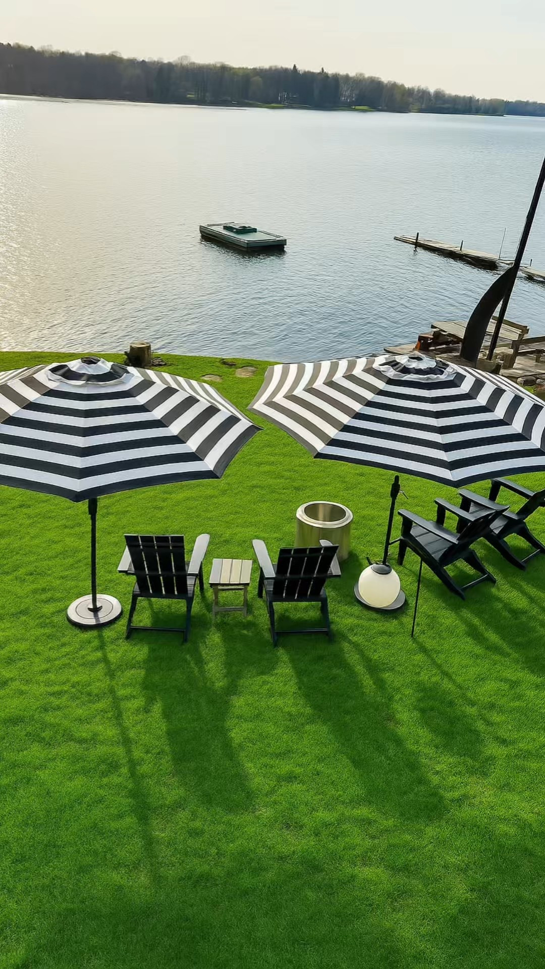 This is What Summer Should Feel Like 🔥 

Rocking chairs, lake views, and a front-row seat to every sunset. Whether you’re sipping coffee in the morning or winding down by an evening bonfire with friends…
this setup is all about slowing down and soaking in those moments. End your day surrounded by good company, the crackling fire, and the peaceful sound of the lake.

And the best part? The rocking chairs are incredibly comfortable—and both the chairs and the fire pit are surprisingly affordable.
#outdoorliving #outdoorlivingspace #summertime☀️ @greenvines2024

#LTKFamily #LTKHome #LTKSeasonal