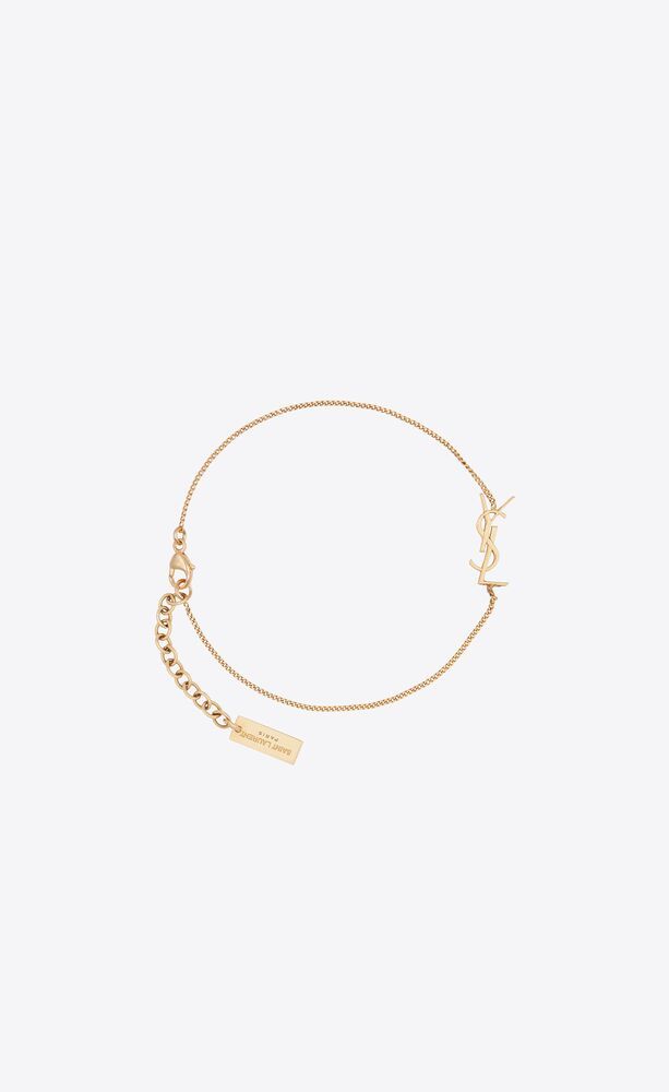 opyum charm bracelet in gold brass | Saint Laurent Inc. (Global)