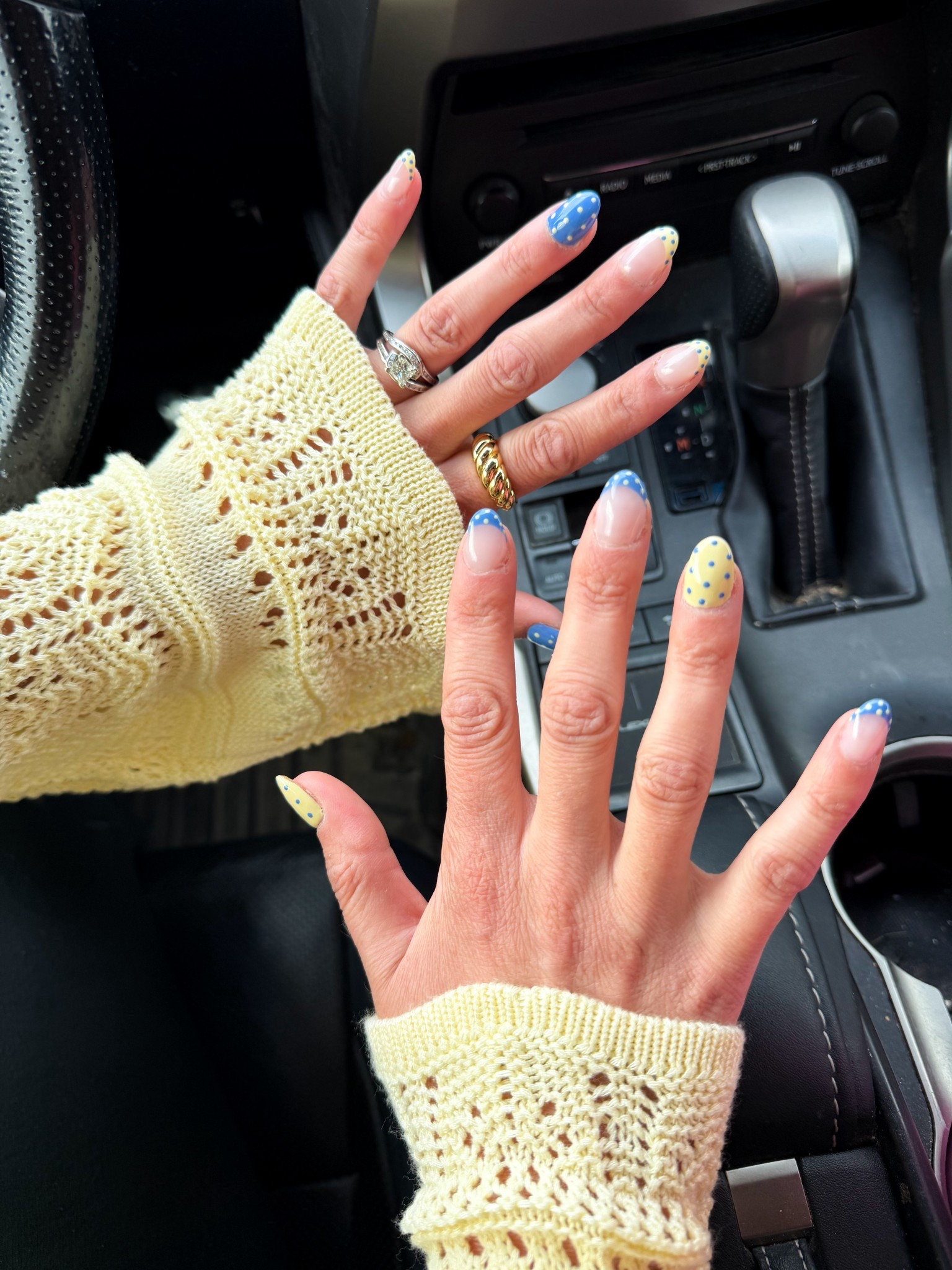 Blue and yellow polka dot nails for spring 

#LTKSeasonal