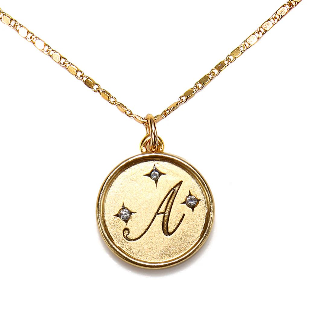 https://www.sequin-nyc.com/products/a-round-script-initial-necklace | Sequin