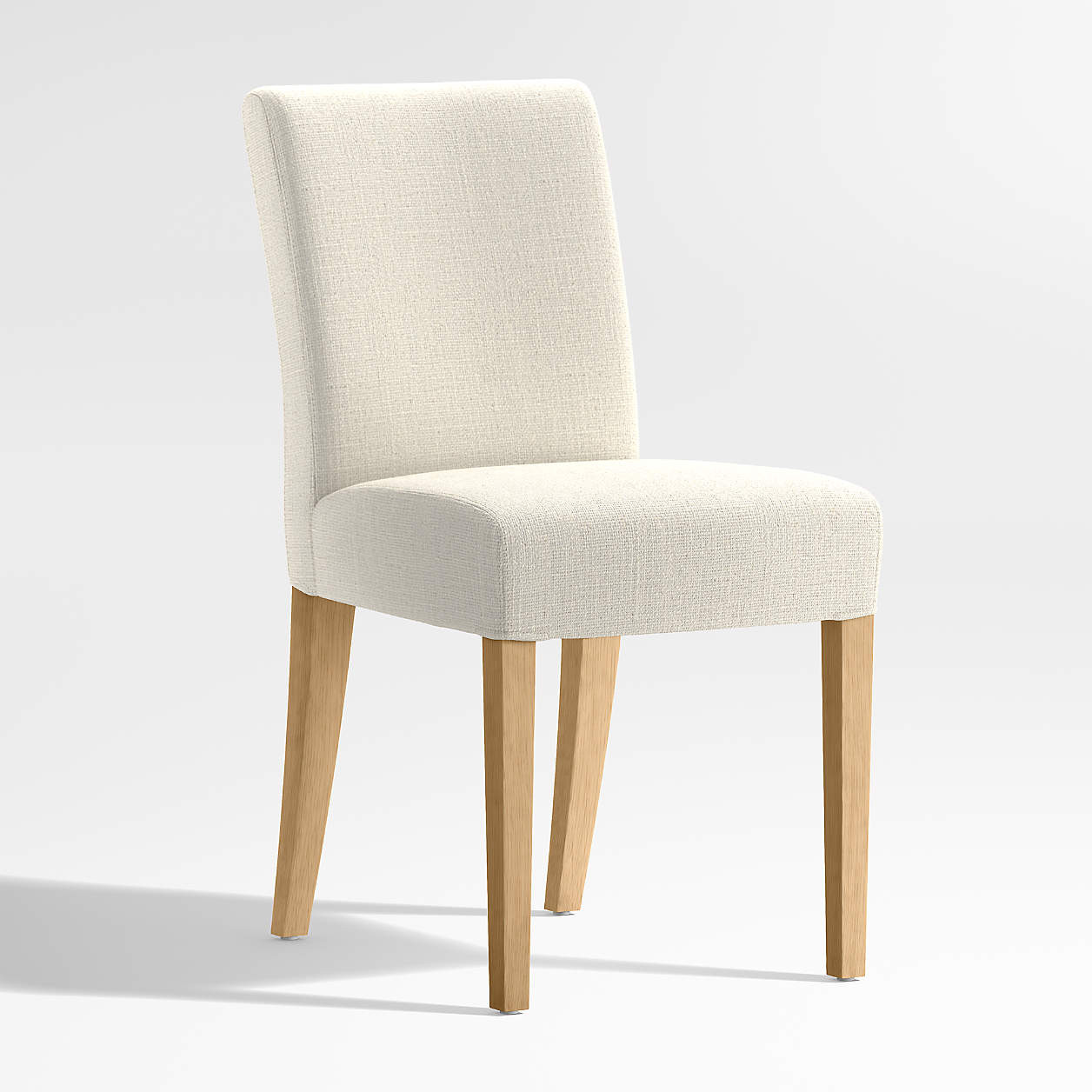 Lowe Ivory Upholstered Dining Chair with Natural Wood Legs + Reviews | Crate & Barrel | Crate & Barrel