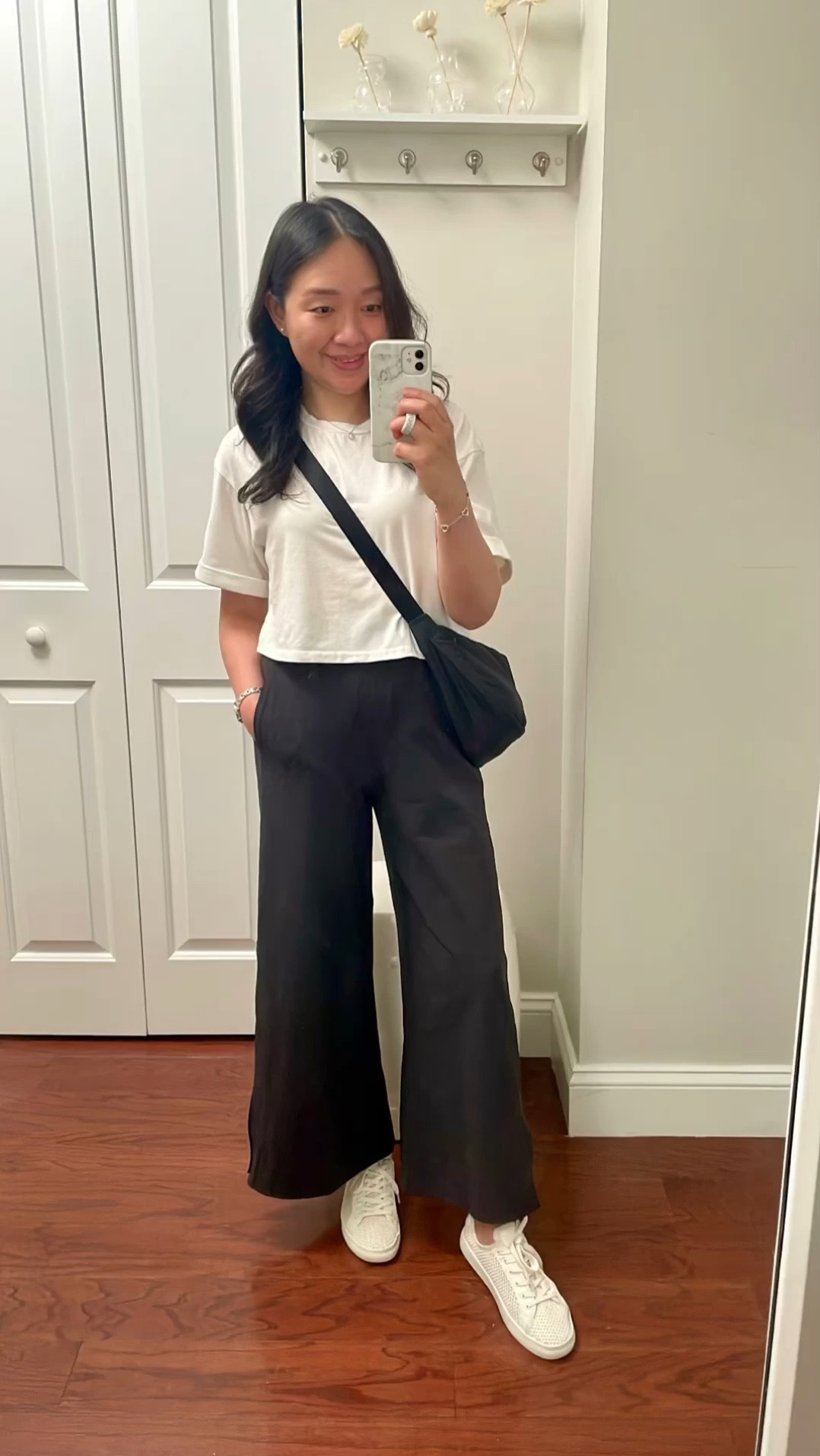 Lululemon wide leg pants in size XS - full review with measurements on www.whatjesswore.com.

Cropped tee in size S which I own in black, navy and grey. Size S is 17" total length.  

#LTKOver40 #LTKFindsUnder50 #LTKFitness