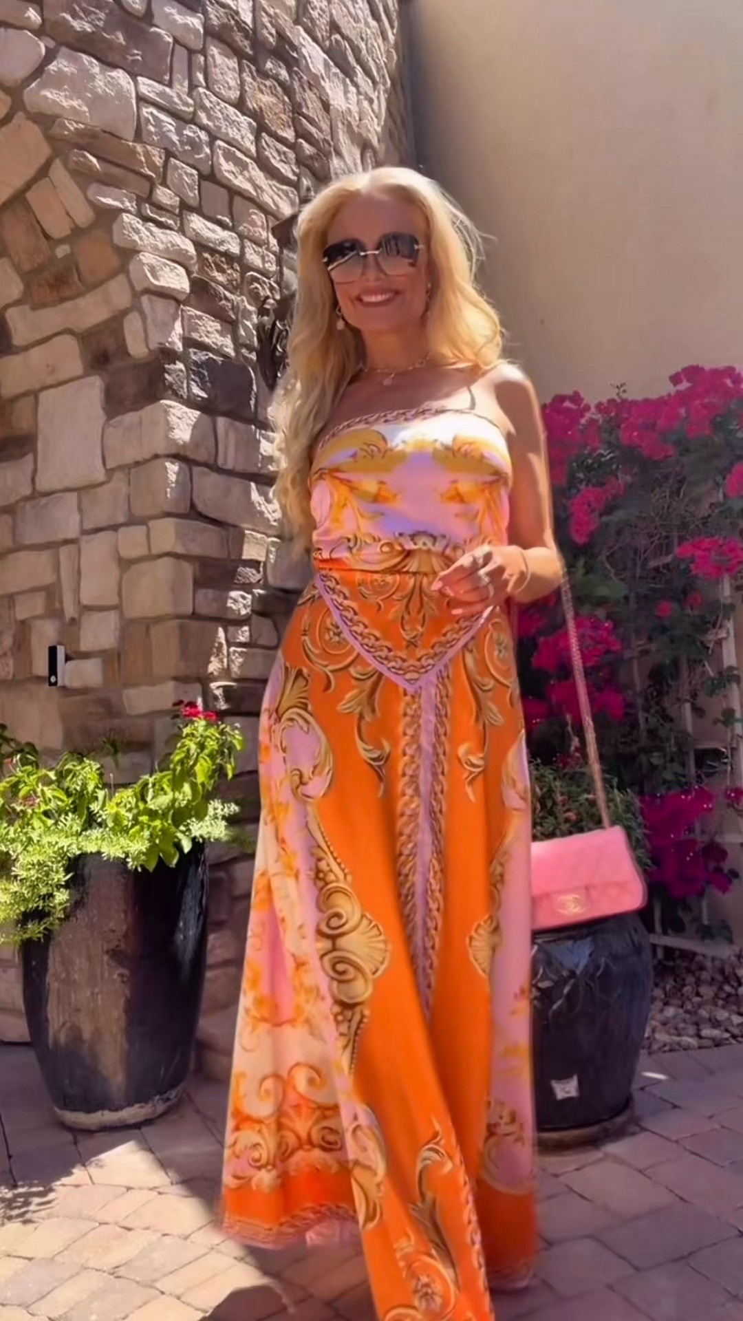 Shop this dress here: https://www.fashionnova.com/products/kimberly-printed-hankerchief-maxi-dress-fncolorname-orange-combo

Or search for "Kimberly Printed Hankerchief Maxi Dress" at fashion nova.com.

This dress will make you feel and look so high-end. Everyone thought I was wearing Versace. I got so many questions about this dress and everyone was shocked that it's currently on sale for $38!!! runs very big. I am wearing a small and I would like to size down to an extra small. 
￼
Linking similar dresses below.

#LTKootd #LTKgrwm #LTKdayinmylife
