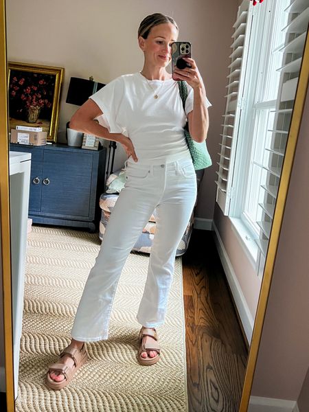 All white outfit! These white jeans are so flattering and the fitted white top with statement sleeves make the outfit more interesting. The tote is an Amazon find and the sandals are comfortable right out of the box 🙌🏻 mine are leather and that color is sold out but I linked the new raffia ones I like even better! 

#LTKSeasonal #LTKstyletip #LTKshoecrush