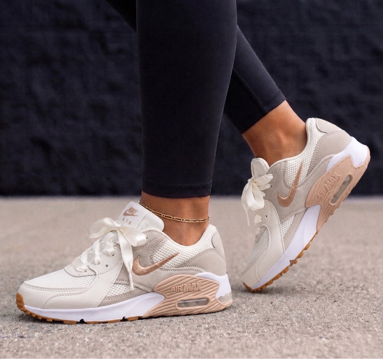 Nike Air Max Excee

The prettiest neutral sneakers you’ll reach for on repeat. 🤍✨ The soft cream, beige, and blush details make these easy to style with everything from leggings to denim, dresses, and matching sets.

Fit: Runs true to size with a lightweight, comfortable feel and great cushioning for all day wear. If you’re between sizes or prefer a roomier fit, consider going up a half size.

Perfect for everyday errands, travel days, coffee runs, or getting your steps in while still looking effortlessly cute. 💕