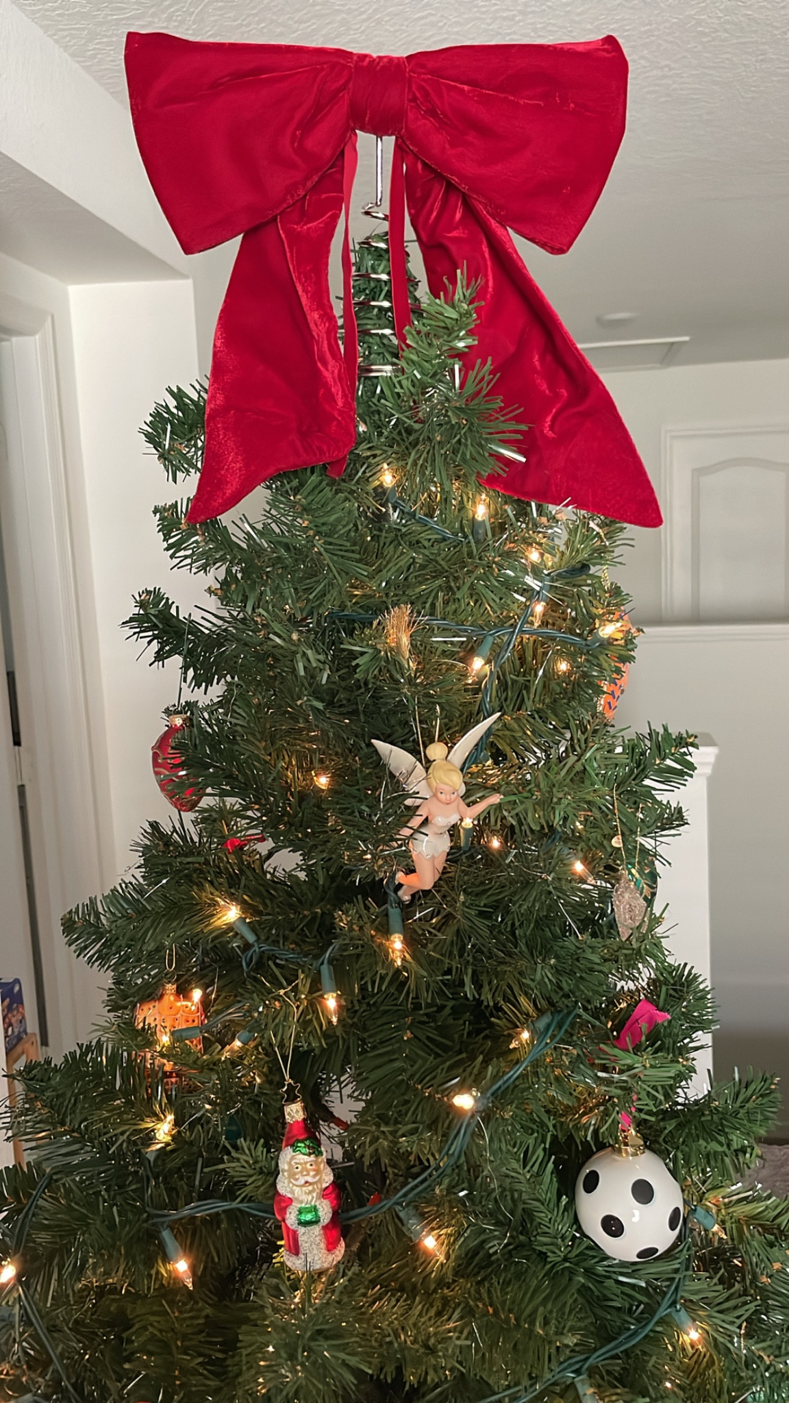 Red Bow Christmas tree topper for under $10. 

#LTKHoliday #LTKHome