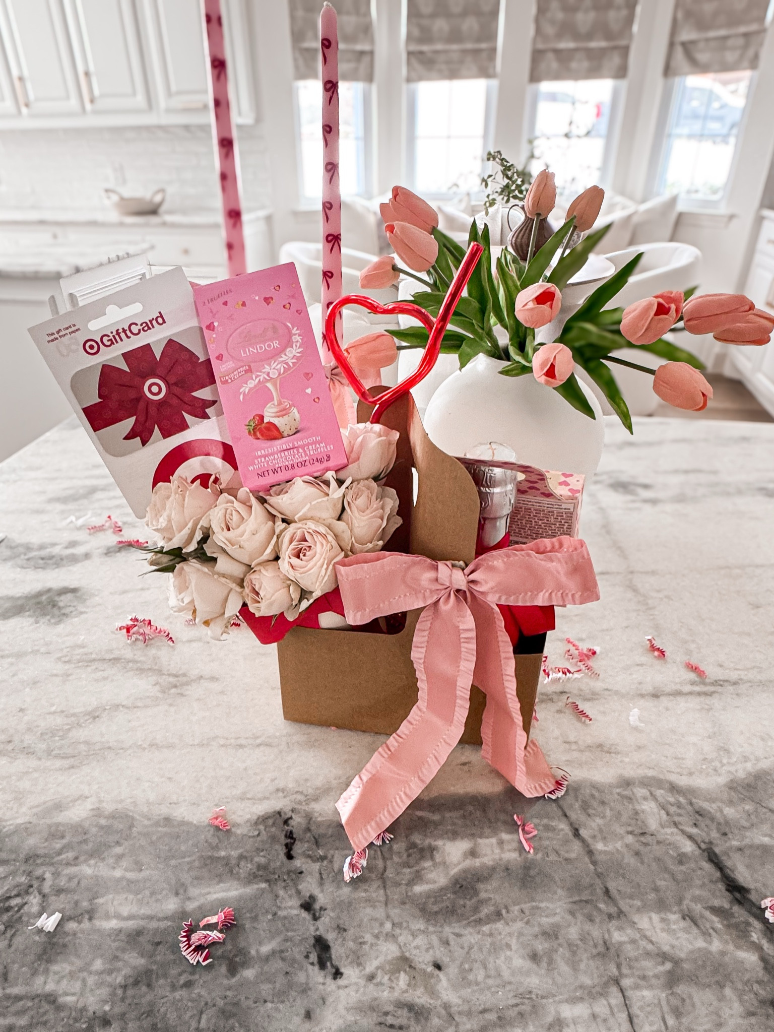 Valentine’s Day gift idea 💕 I used a cute little cardboard drink carrier as the perfect gift holder! I arranged some Trader Joe’s flowers in the cutest paper cup and added a Target gift card and chocolates. On the other side, I included a mini bottle of Prosecco with more chocolates and a bow. 🌸🍫🥂This thoughtful gift is perfect for friends, coworkers, neighbors, or anyone you want to surprise! You can make it your own—swap the Prosecco for soda or sparkling water, or add a coffee gift card inside the cup instead of flowers. 

#LTKSaleAlert #LTKSeasonal #LTKFindsUnder50