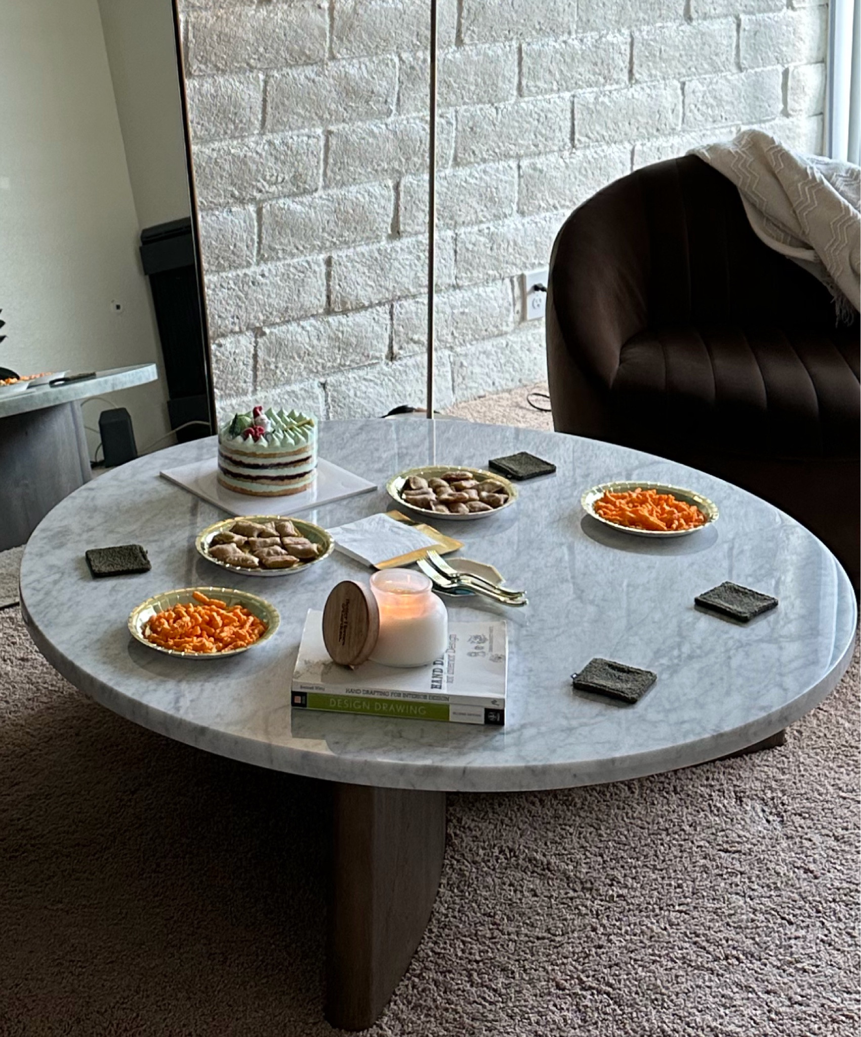 The most comfortable swivel chair ever and the most beautiful piece of marble table ever! #tolicoffeetable #audieswivelchairs #livingroom #archedmirror #party #livingroomideas #coasters

#LTKeurope #LTKstyletip #LTKparties